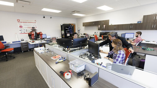 people working in lab space